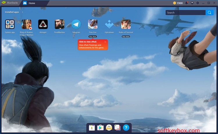 BlueStacks showing Android home screen, app icons, and gaming controls on a Windows desktop environment.